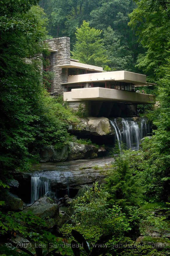 house over waterfall