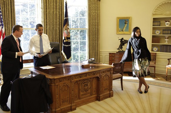 obama with michelle and staff member