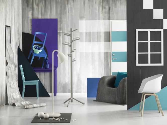blue chair on wall in grey room