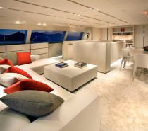 Driftwood plucked from the Caribbean shores, were used as color and texture inspiration for the interiors, and were repeated throughout the yacht for a harmonious effect. Some doors are only distinguished by their metal handles.
