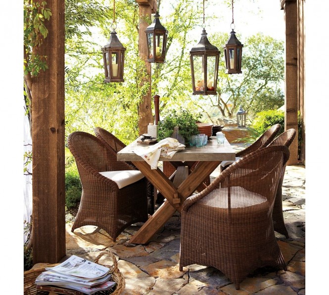 Wicker works, especially with a rustic country house such as this one, with its stone floors and hanging lanterns.