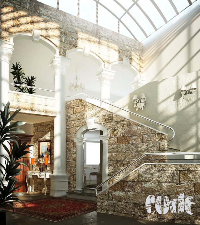 This entrance hallway evokes Jordan culture with stone stairwells, persian rugs, ornate columns and doorways, and an array of exotic plants.  The glass domed ceiling beautifully allows pools of light to brighten the space and make it appear as if one may be outdoors.