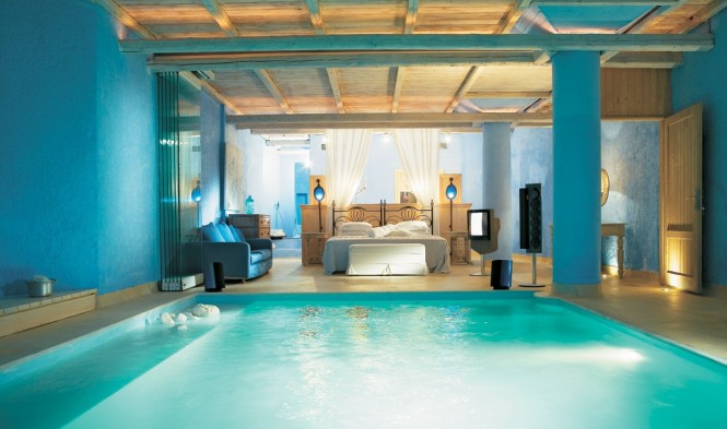 This suite in Mykonos Blu Resort in Mykonos Island, Greece, offers a pool at the foot of the bed; great for a refreshing early morning plunge, not so great for sleep walkers.