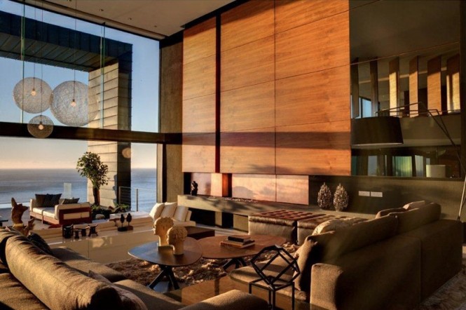 Neutral wood panel living room sea view