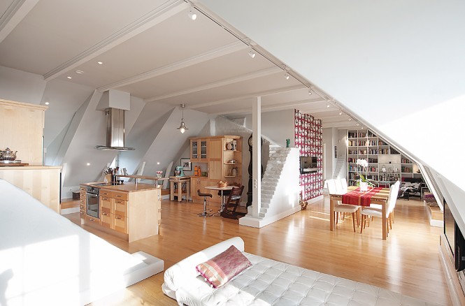 As you look closer at this open plan residence, you begin to notice wall remnants that remain as low level dividers in the space; they have the appearance of tiny staircases that disappear mysteriously into the wall or off into the ceiling. The unusual brickwork brings charm and interest to the large airy space, and the homeowners have been careful not to overpower the original features with a complicated décor.