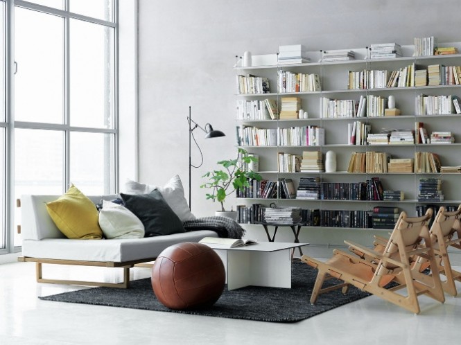 white scandinavian living room bookshelves