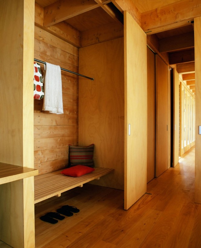 Wood clad hallway closet