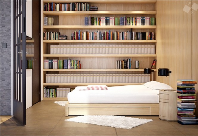 Fitted shelves flank the walls of several areas in the home, including the bedroom, where books appear to take precedence over anything else, including clothes and accessories; twin bedsides hold simple black reading lamps to illuminate all of that bedtime reading material.