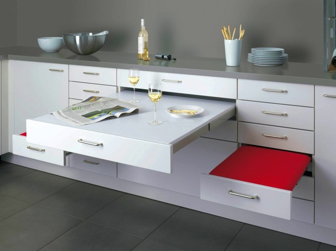 This pull-out dining design, by Alno, may look like a lightweight worktop extender, but features sturdy seats that can cope with loads up to 100 kilograms and a very generously sized table top that simply slides away after dinner.
