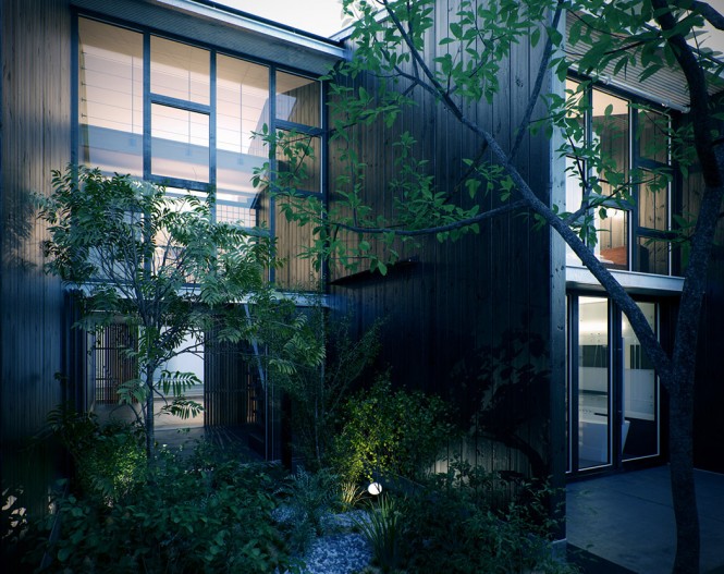At the front of the home, a towering glass façade overlooks a zen-like courtyard, on the approach to a minimalist entranceway flanked in wood. Slender trees soften the lines of the modernistic architecture and encourage a more naturalistic feel that in turn leads into the pure materials of the interior.