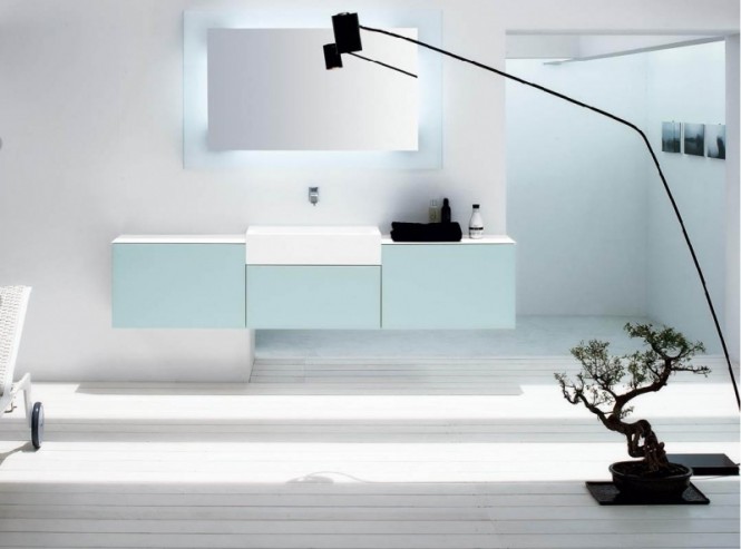 A singular bonsai commands attention and looks great in a minimalist space like this contemporary bathroom. Be sure to keep them out of reach if your have children or pets in the home though, not only will your precious plant be ruined by curious hands and paws but many plants are toxic.