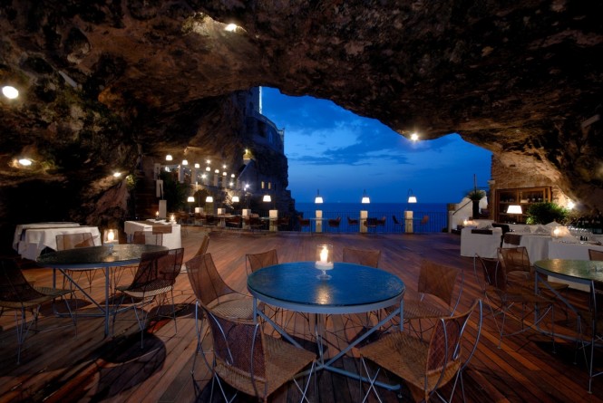 Carved right into a rock overlooking the Adriatic Sea, Hotel Ristorante Grotta Palazzese Polignano a Mare, Italy, is situated amongst a stunning backdrop of caves that have had visitors in awe for centuries.