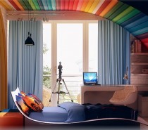 Ticking all the color boxes are these unisex rainbow inspired rooms, the perfect place to dream about finding that pot of gold!