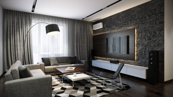 This sophisticated black and gray design uses pattern and texture to bring all of the interest. A large geometric patterned area rug demands attention in the living area, along with a heavily textured feature wall that is highlighted by an illuminated TV surround.