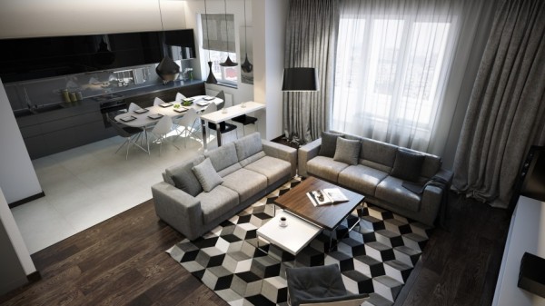 Upon the eye-catching rug, two clean lined sofas sit in an L-shaped arrangement, one in front of a softly dressed window and the other sectioning off the kitchen dining area. The scatter cushions on the seating have been kept subtle and plain so as to avoid fighting with the busy floor treatment.