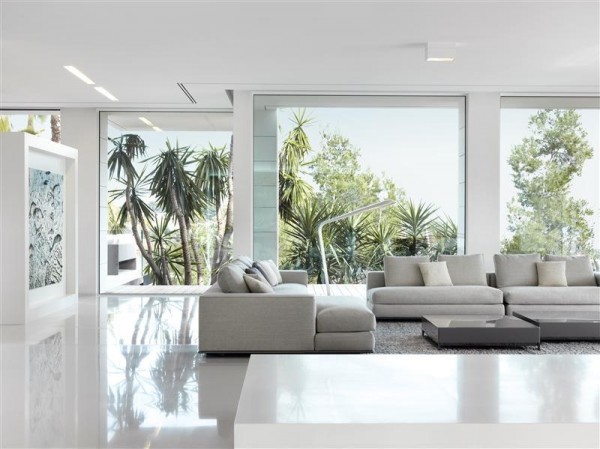 living room with floor to ceiling glass windows