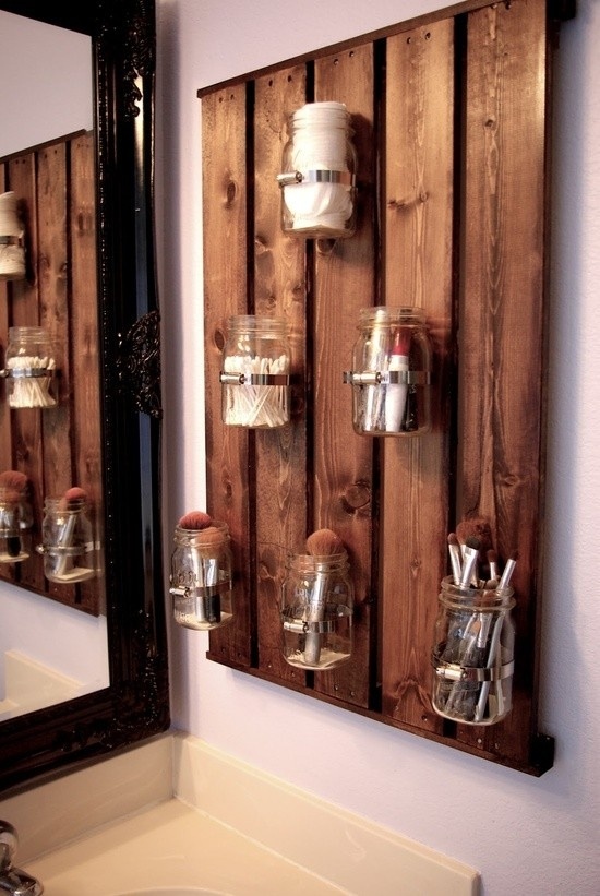 This rustic mason jar board is great for keeping makeup brushes in check.