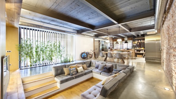 Industrial Home with Interior Planting and Transparent Walls
