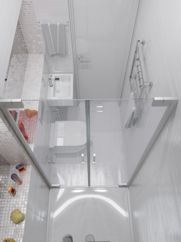 Small but perfectly formed, this tiny shower room is kitted out with a mini basin and wall mounted toilet.