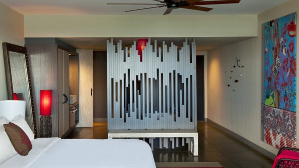 Bold lamps push this scheme forward too – though this cool room divider steals the show.