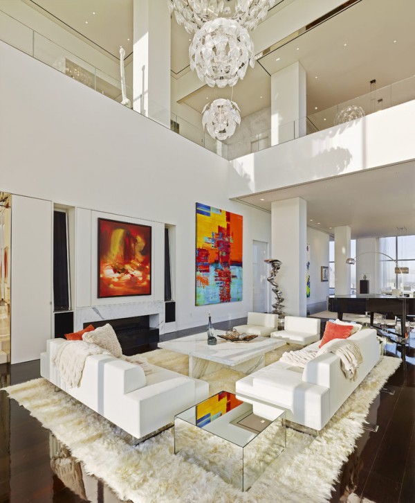 With a perimeter of 16' foot floor- to-ceiling windows, the essence of the apartment is the sculpture garden at its entrance. The garden features a spectacular 30' water wall and reflecting pool overlooking the famed United Nations headquarters along the East River. This superlative dwelling also features a 75' expanse of living and dining area along with a Italian kitchen, library, game room, day spa, home theater and professional grade listening room with recording studio. Seemingly without limitation, every feature from the façade to the interior is meticulously planned and detailed with a modern and minimalist approach using only the most pristine of materials creating a unique and exceptional setting to rival.