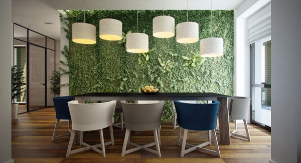 Nothing says '21st century' quite like a green wall. Bringing some of the outdoors inside while taking up minimal floor space and improving indoor air quality, a green wall adds loads of colour and texture to a design. If you plan to install one, look for a space like this near large windows, because living plants require ample light indoors. Also, plan from the beginning how your plants will get their water, and where the excess water will go. These pendant lamps express the design elements of rhythm and repetition, while adding surprise with varied heights. They almost look like musical notes on paper!