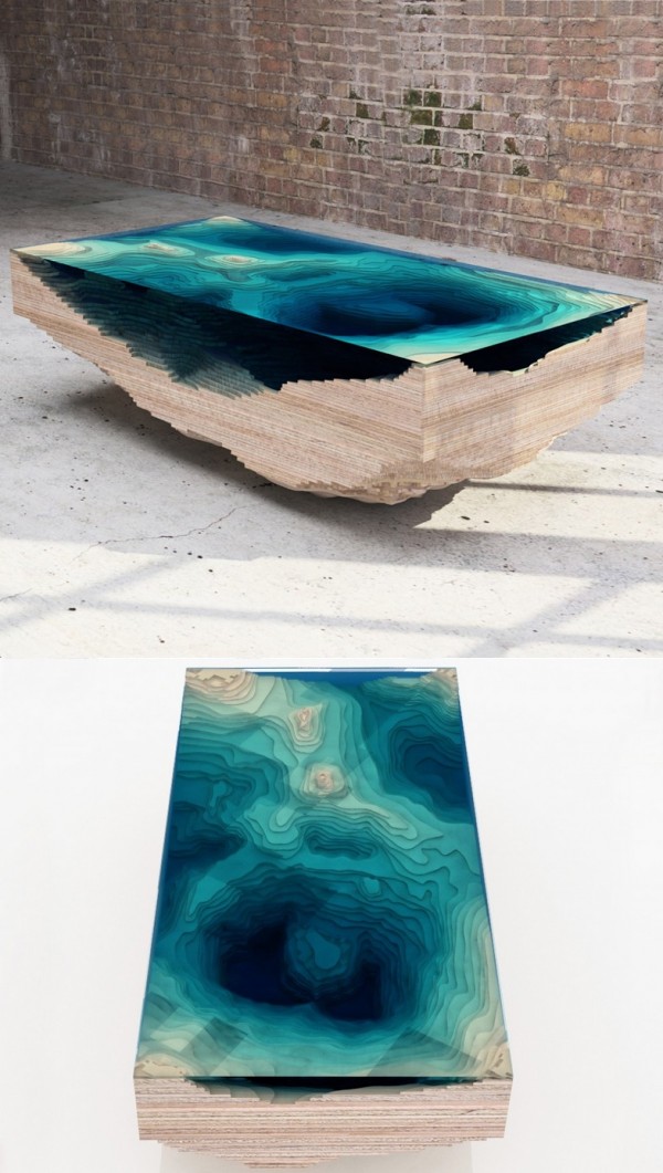 Another table that takes its inspiration from nature. The way the table is cut, it almost appears as if a puddle of clear blue water is suspended in the piece.