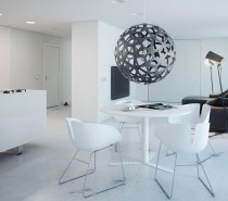 A Sleek Apartment the Divides Rooms Creatively