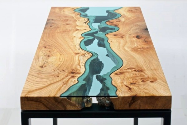 The amazing design here uses wood and class to create a coffee table that mimics real life topography.