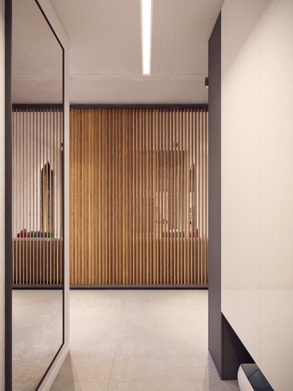 The custom room divider creates separation, but the use of slats means that it doesn't stop light from filtering through.