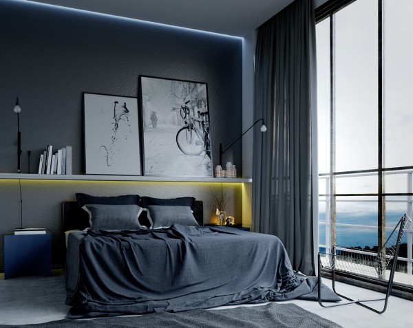 Cool grays and black and white artwork establish this bedroom as a creative retreat.