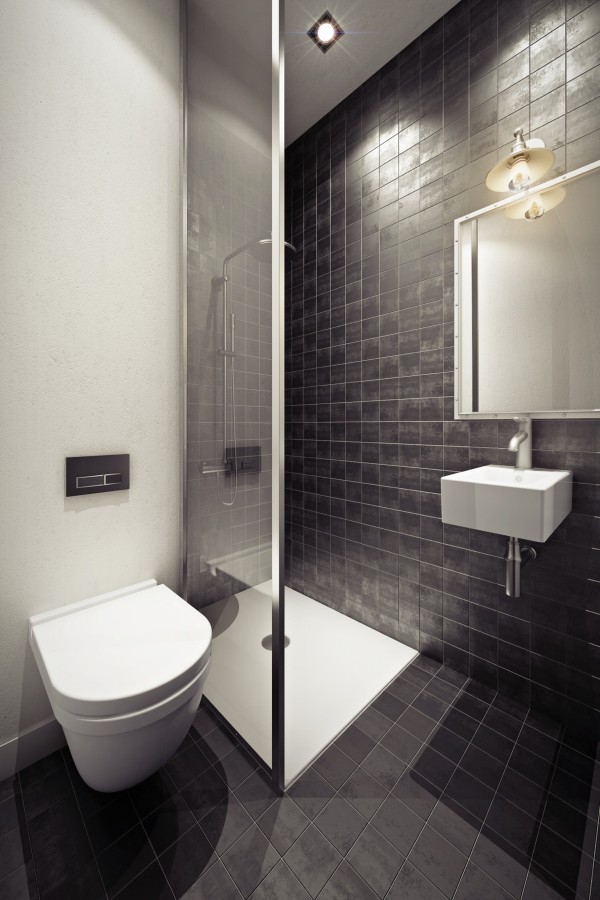 A small shower stall and floating sink in a tiled bathroom add a practical if cozy final touch.