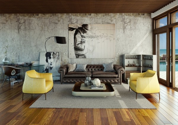 Cool unfinished walls accented with a pristine chesterfield make this living room super chic.