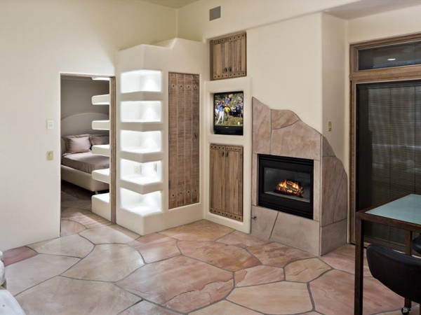 Flagstone accents being a little bit of depth to this build in fireplace.