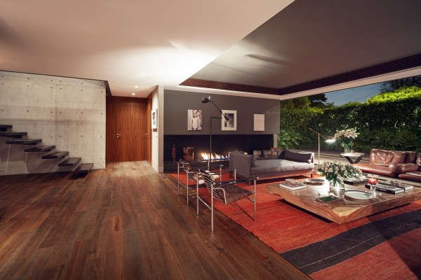 Inside we can see where the architect took cues from the modernism of the 1960's with this expansive open living area.