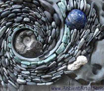 Larger stones, shells, and fossils can add important pops of color and texture.