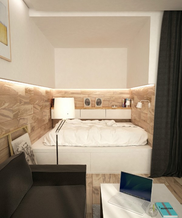 The full sized bed sits in a cozy cubbyhole and can be hidden from view in the event of guests.