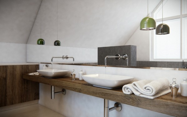 A wood countertop is an unexpected but lovely addition to the spacious bathroom design.