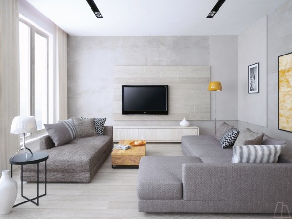 Simple is perfect in this cool grey living room with massive, deep sofas. They make you want to take a nap even when you're barely out of bed.