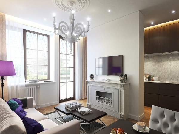 The last apartment has a softer, more feminine feel, complete with modern chandeliers and cool violet tones. Gauzy curtains and plenty of soft lighting make the home welcoming, calm, and modern.