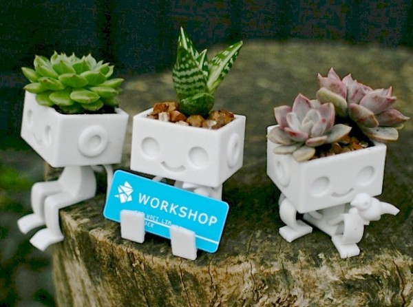 These adorable 3D printed tiny robot planters are sure to bring a smile to any face. One is even shaped perfectly for welcoming guests with a business card.