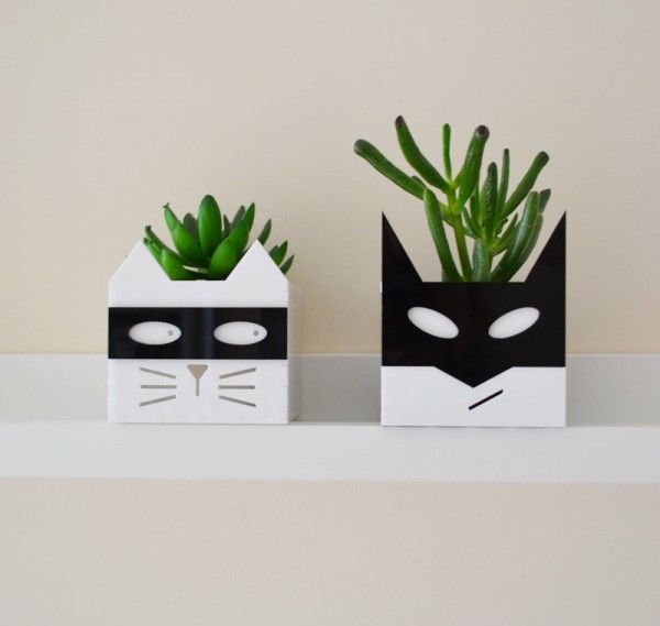 You can choose between a superhero or a supervillain planter (the cat is the evil one, obviously) but you don't have to because you can get both.