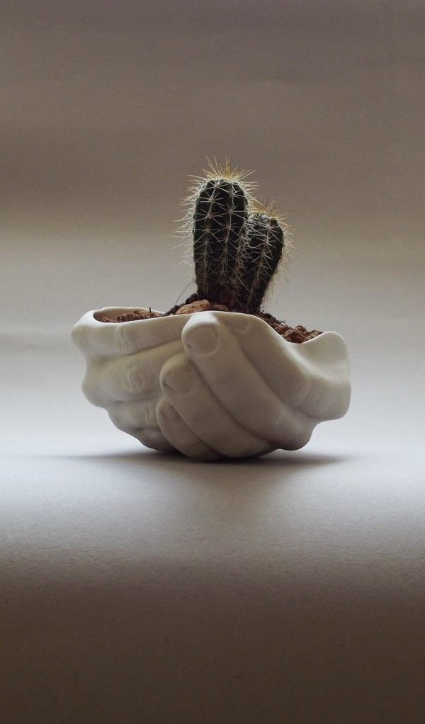 This planter, made of two folded hands outstretched is instantly heartwarming.