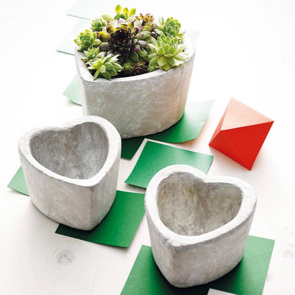 Show your love for plants and foliage with this concrete heart pot.