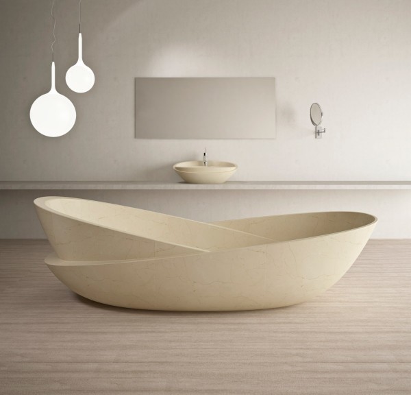 At first glance, the Ciotole Tub looks like two oblique basins, but this sculptural design is actually made from a single piece of masterfully carved beige marble.