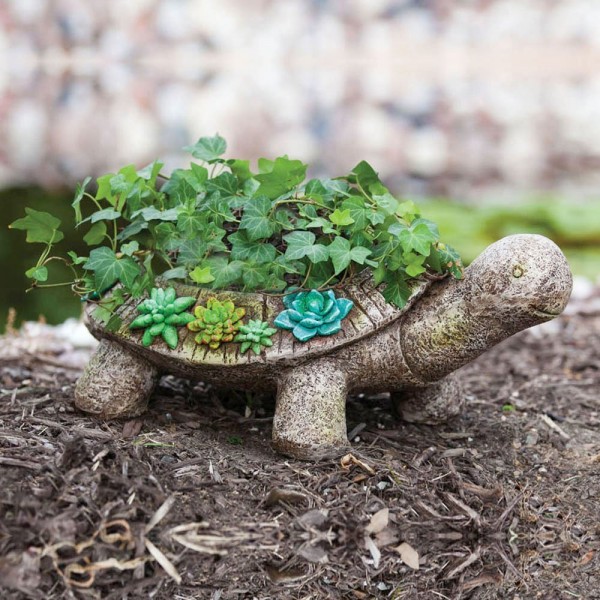 Seeds take time to grow. Channel some patience with this stone turtle planter.