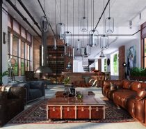 This eclectic loft was designed for a man who appreciates art, loves to travel, and adores his cat. There’s plenty of plush oversized seating for his feline friend which fits perfectly into this giant space.