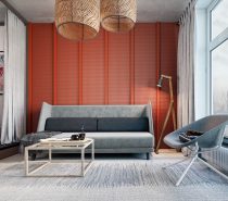 The first interior design makes waves with a bold tangerine accent wall – an adventurous style for such a small apartment. Organic decor like floral prints and wicker lights bring a little nature into the interior, a fun contrast to an apartment with otherwise urban and industrial background.
