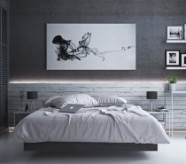 There's nothing quite like climbing into a big white bed that looks like a cloud. Best, yet - you might just feel like you're floating in the night sky against those charcoal black walls.