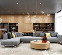 Grey floors, curtains, and sofa set the decor theme against a backdrop of rich wood grain. A leather chair and marble countertop contribute to a luxurious aesthetic, while starburst pendant lights invoke magical modern inspiration. This open layout is certainly inspiring – especially for those who have an eye for detail.